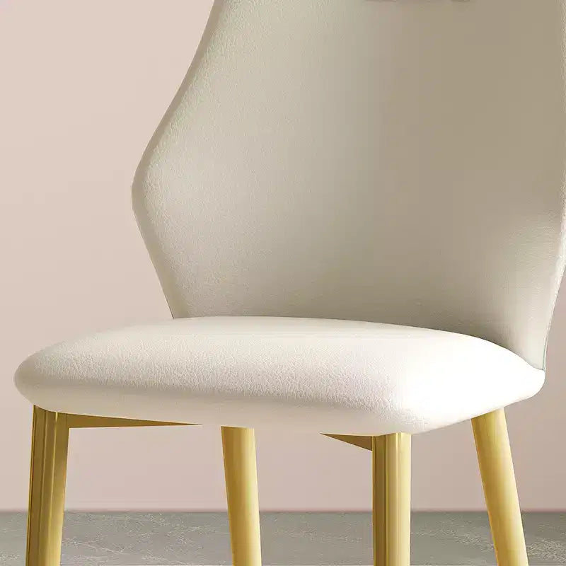 Chaises de salle à manger avec assises en cuir PU de haute qualité, pieds en acier carbone plaqué or et dossiers ergonomiques
